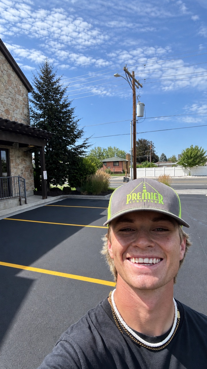 Colton at a freshly striped Premier Striping parking lot