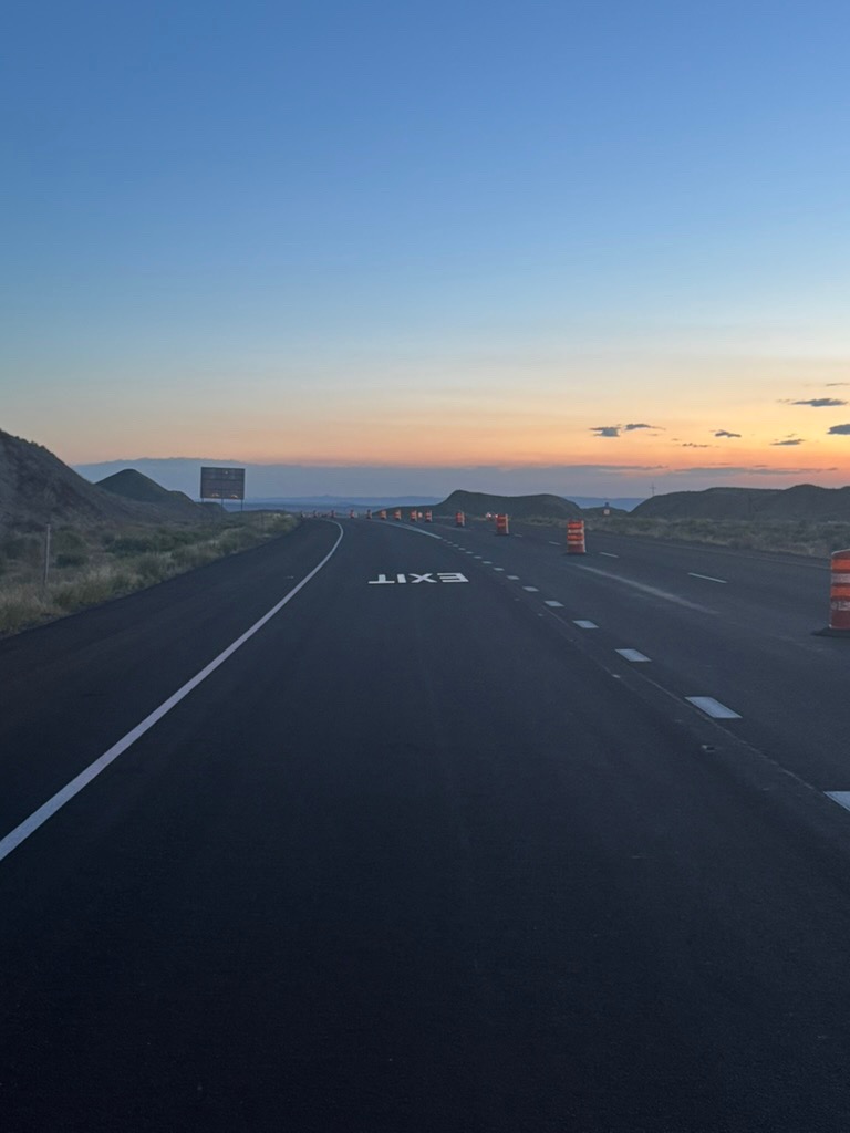 Fresh YIELD roadway marking at dusk
